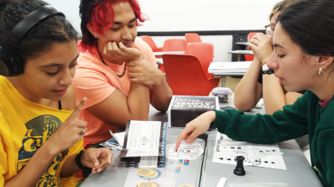 Students work on a group project together